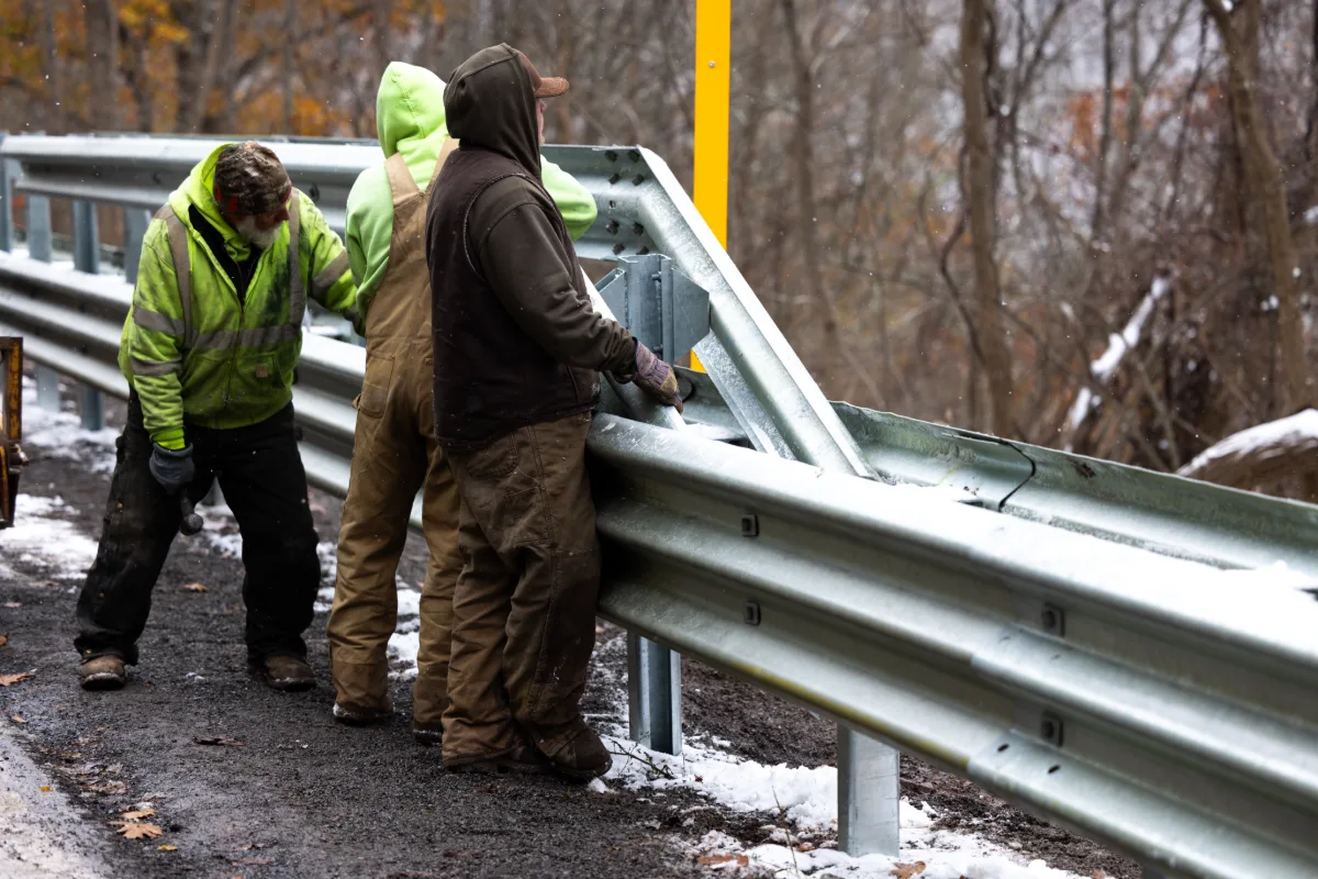 Crew installing the Gregory Highway Guardian 5 high-containment steel barrier system in West Virginia