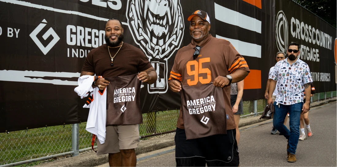 Browns fans with America Build With Gregory merchandise
