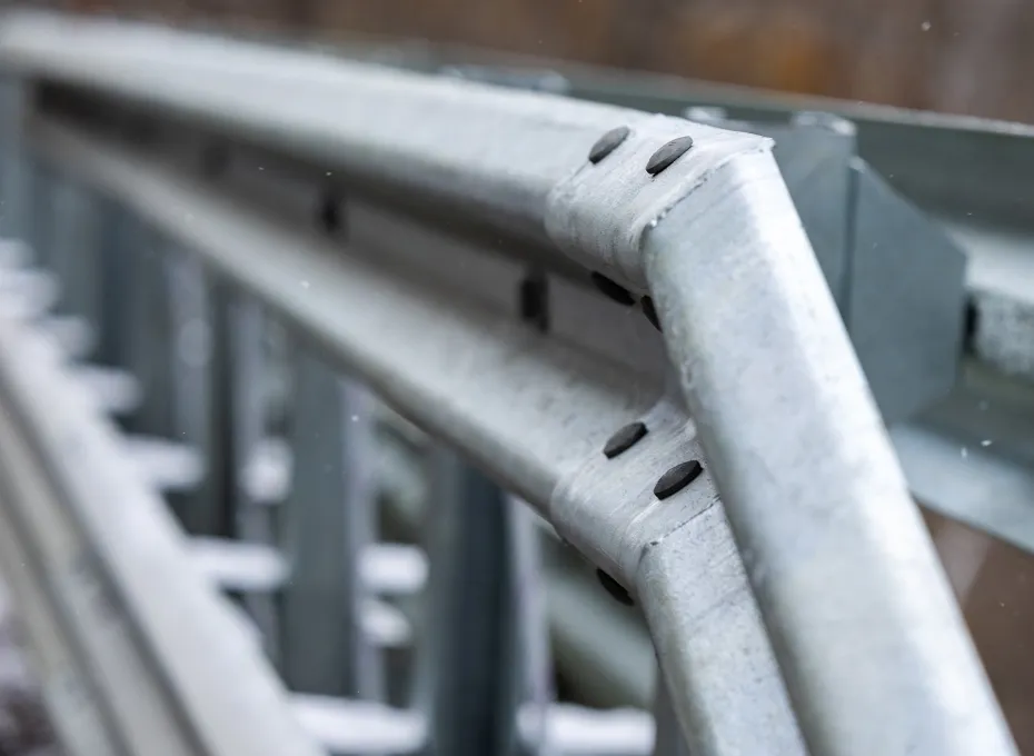 Guardrail for highway safety in the event of a distracted driving crash.