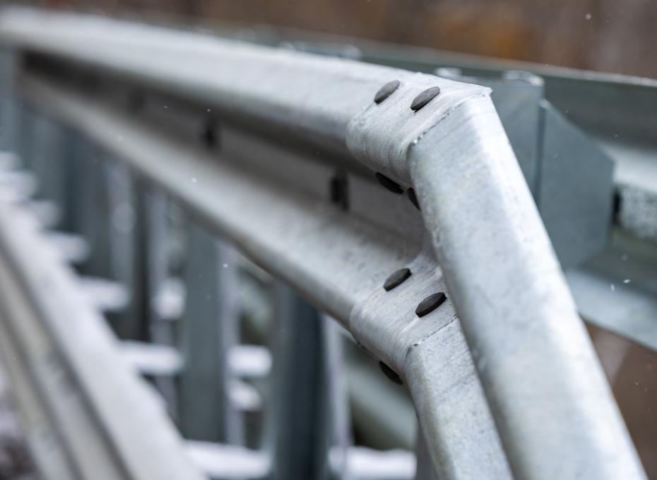 Guardrail for highway safety in the event of a distracted driving crash.
